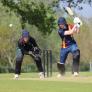 Cricketer hitting the ball and running in the BOWS competition in the sunshine thumbnail