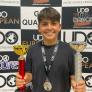 Forrest holding his trophies and with a medal at the UDO Southern Streetdance Championships thumbnail