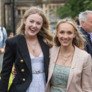 Pupils with their arms round each other celebrating their Graduation in the Quad thumbnail