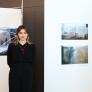 Ukrainian pupil Liia next to artwork displayed at the 2nd Anniversary Exhibition for Ukraine thumbnail