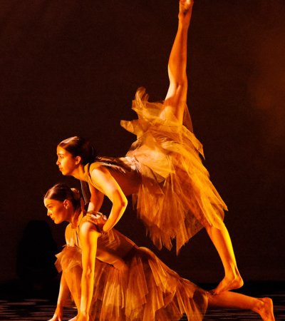 Bee and Maya performing their winning duet on stage at the Sussex Festival of Performing Arts