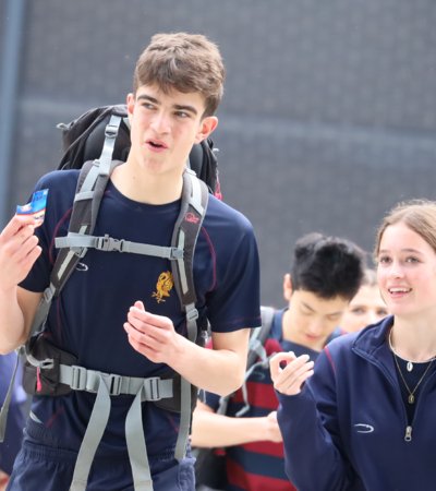 DofE pupils on the stairs of the SSS walking the distance of Everest for charity