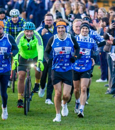 Kevin Sinfield and his support team being applauded along the Home Ground by pupils and staff on his 7 in 7 in 7 Challenge