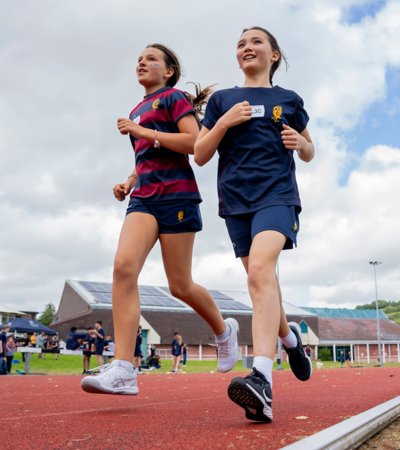 Pupils competing in a track event for Lower School Sports Day