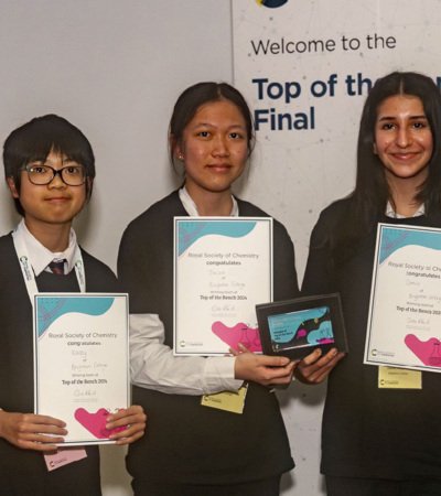 Pupils holding their certificates as winners of the Top of the Bench Chemistry winners