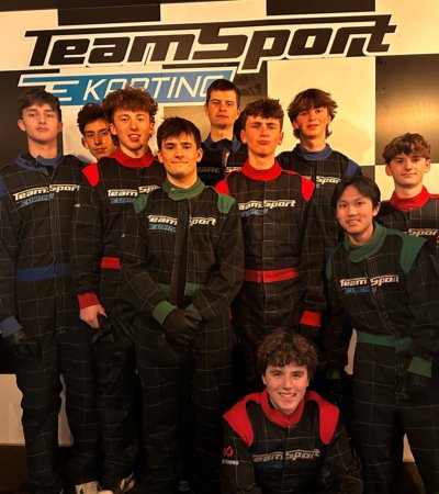 U5th at Team Sport Go Karting in racing boiler suits