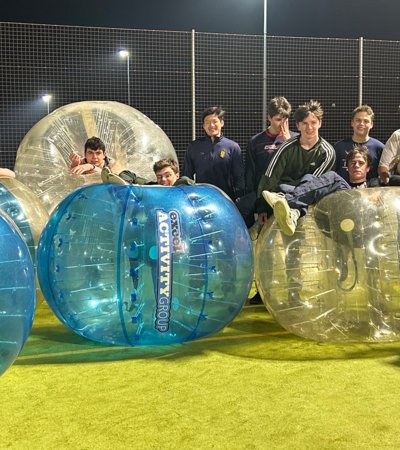 Sixth Form boarders and their tutor Zorbing for a tutor group outing