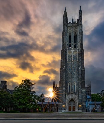 Duke University main building with the sunset behind