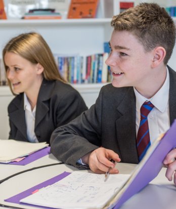 Pupils discussing their work in a History lesson