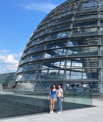 German pupils standing at the top of the Reichstag next to the dome in Berlin