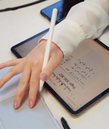 Pupil's Apple Pencil and iPad on the desk in an A-Level Maths lesson