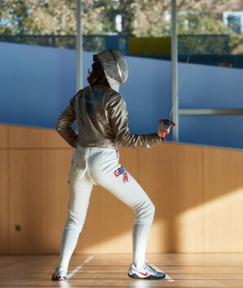 Pupil at Fencing Club in their GB Fencing kit in the NASH in the SSS