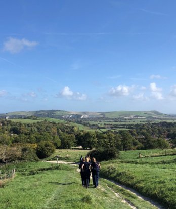 Pupils in Green Team enjoying walking through the South Downs in the sunshine