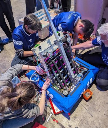 Pupils in Istanbul fixing their competition entry model for a Robotics competition