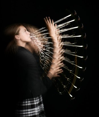 Pupil playing the trumpet with multiple shots of different angles in one photos