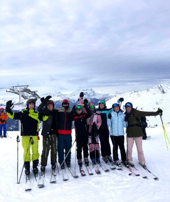 Pupils in their Ski gear on the mountains on a Ski Trip