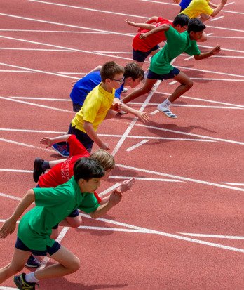 Prep School pupils on the Withdean Track competing a race at Sports Day