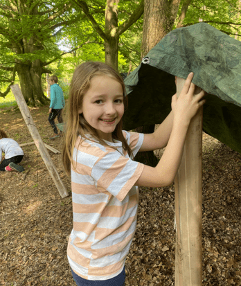 Prep School pupils on a school residential trip doing a teambuilding activity