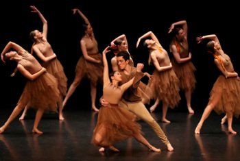  Dancers performing a group piece on the stage at the South Theatre Arts Festival 