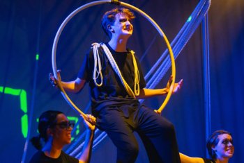  Pupils in an aerial hoop pulling ropes in the production of A Monster Calls 