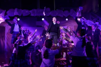  Prep School pupils on stage performing their production of Matilda 