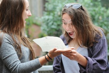  Pupils excitedly sharing their results on Results Day 