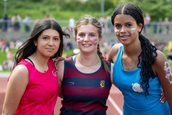  Pupils enjoying representing their respective houses on Sports Day 