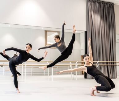  Sixth Form dancers performing a routine together in the Dance Studio 