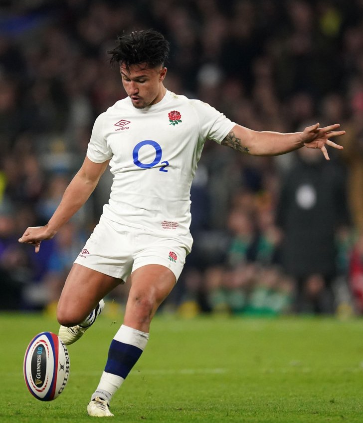  England Rugby player Marcus Smith taking a kick in an international game 