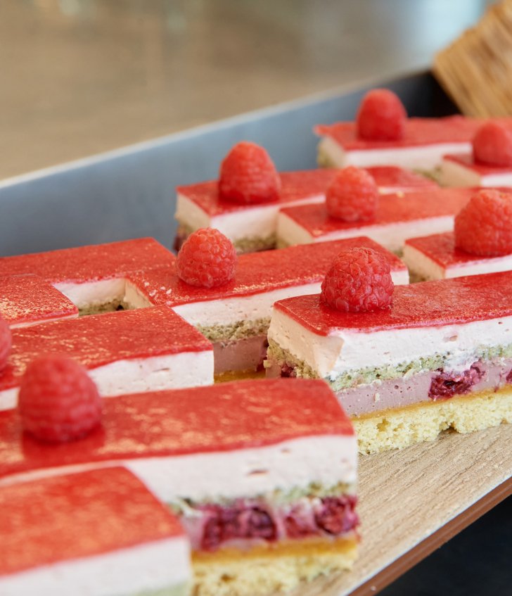  Raspberry Cheesecake being served as dessert at a Wedding dinner 