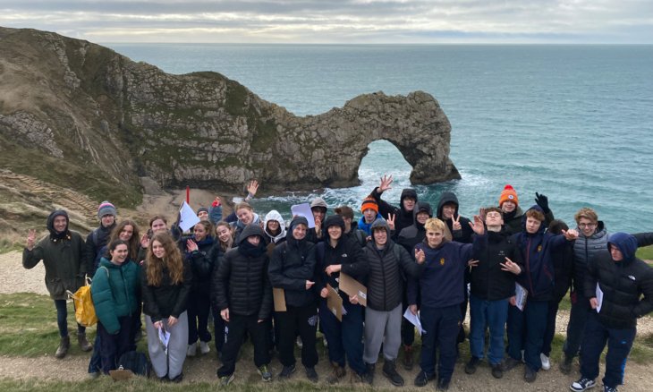  Pupils on a Geography Trip to the Jurassic Coast in front of Durdle Door 