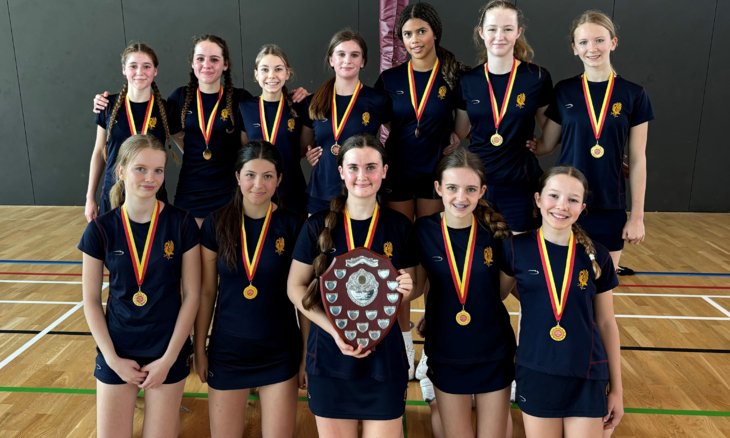  U14A Netball Sussex Cup Winners with their medals and trophy 