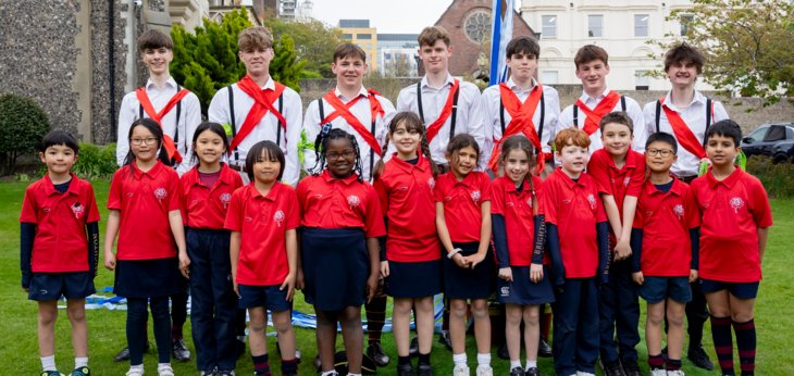  Pupils in Morris dancing outfits and red St George's House shirts on St George's Day in the Quad 