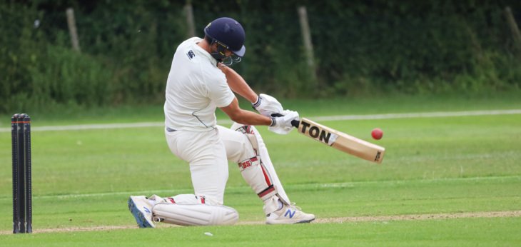  Pupil bending down to hit a shot in the BOWS competition 