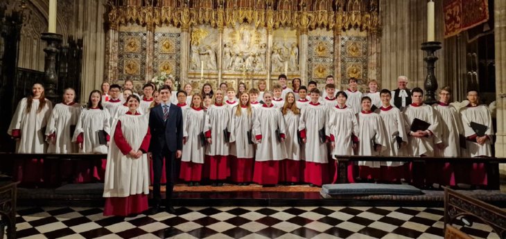  Chamber Choir standing in front of the altar performing Evensong at St George's Chapel 