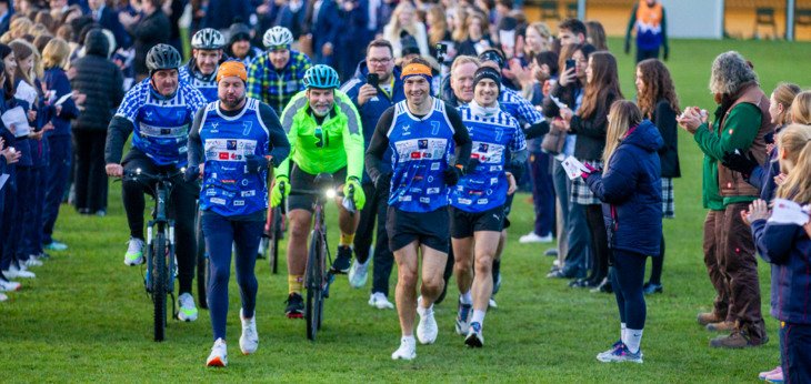  Kevin Sinfield and his support team being applauded along the Home Ground by pupils and staff on his 7 in 7 in 7 Challenge 