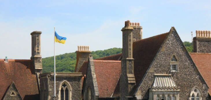  Ukraine flag flying up the flagpole in the Quad on a sunny day 