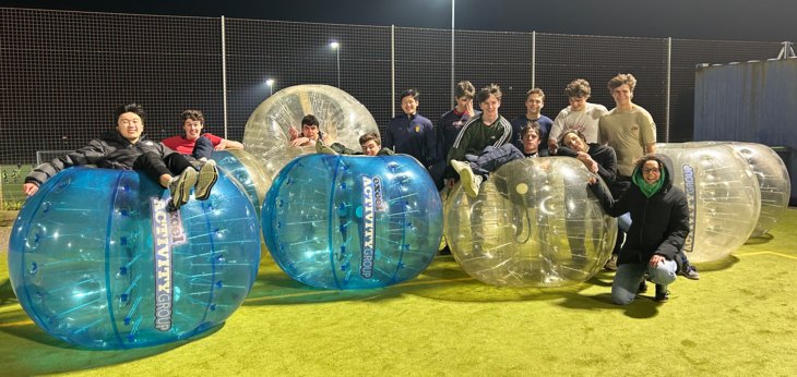  Sixth Form boarders and their tutor Zorbing for a tutor group outing 