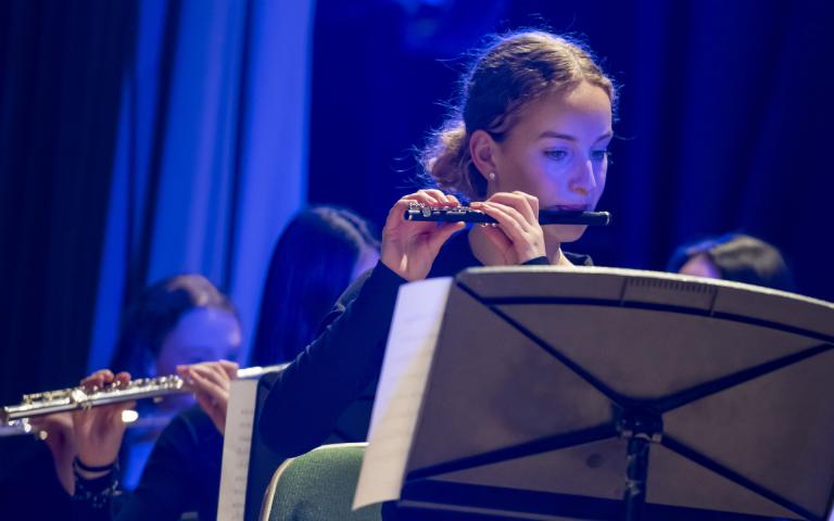  Pupil playing the piccolo on stage in the Film Concert 