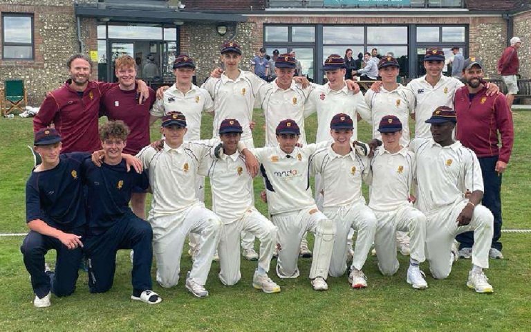  Cricket 1XI team at BOWS competition on the field in cricket whites 