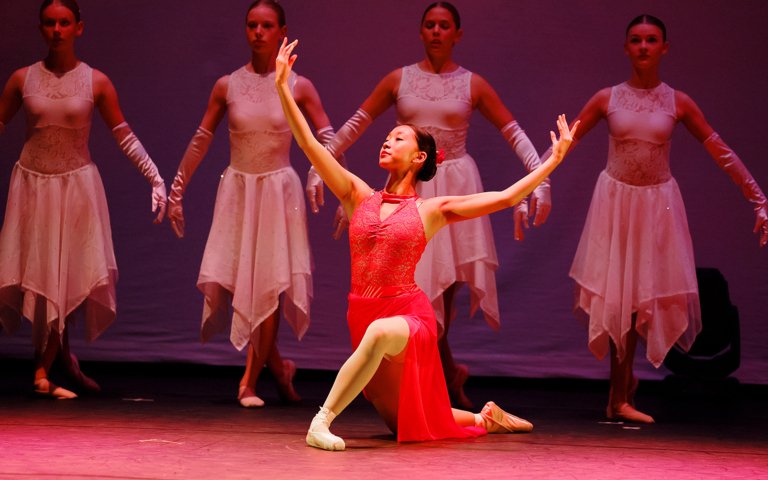  Ballet dancers performing a piece on stage in the Dance Show 