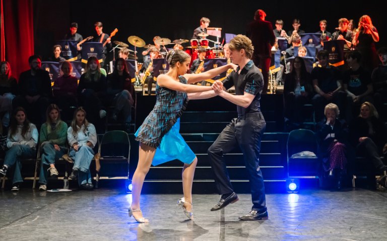  Finalists on stage in the final of Strictly Come Dancing in blue and black matching outfits 