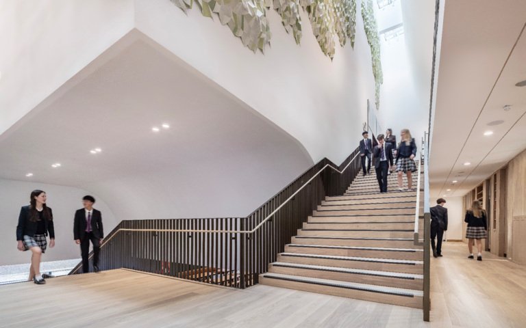  Pupils in the Richard Cairns Building walking up the stairs to lessons 