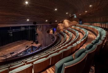 Seats in the Auditorium looking onto the stage in the Cairns Theatre in the Richard Cairns Building