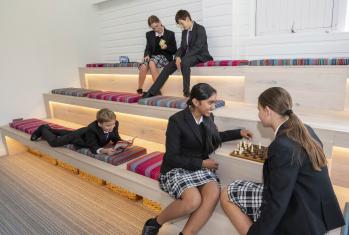 Pupils in the Lower School Common Room enjoying reading, playing Chess and other games