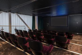 Velvet seats and screen in the Kino cinema in the SSS building