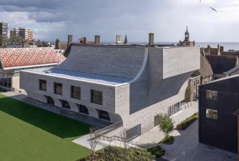 Aerial photo of the Richard Cairns Building on a cloudy day