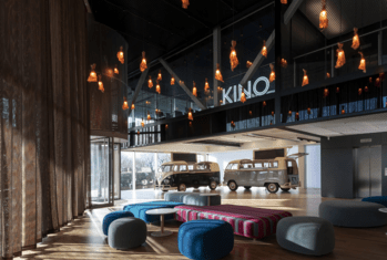 Ricci Atrium with a seating area, the Coffee Campervans and a view of the upstairs Kino