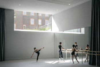 Dance scholars practicing at the barre in the Dance Studio