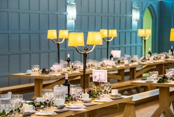 Tables beautifully decorated in preparation of a wedding reception